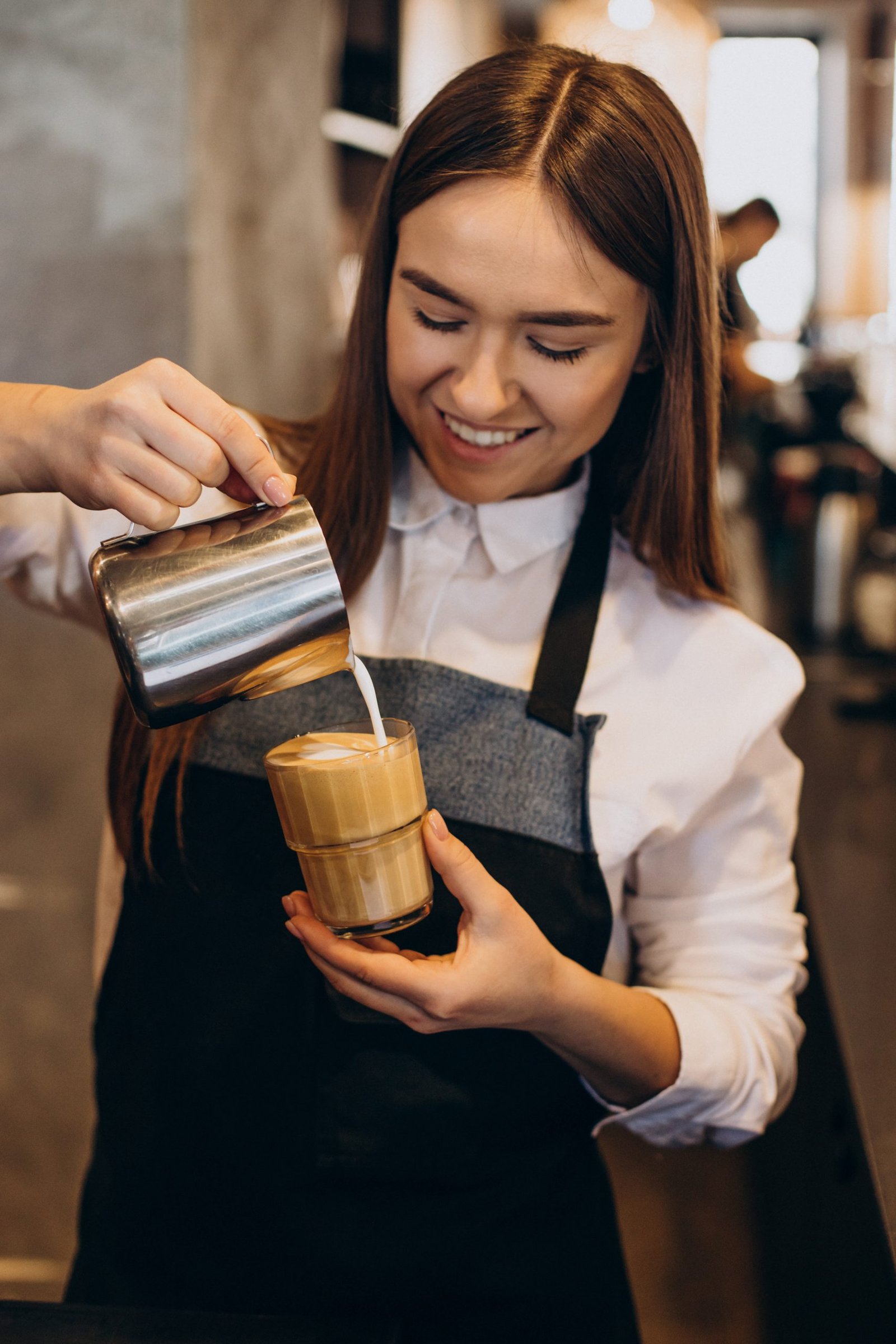 barista preparing latte coffee house scaled