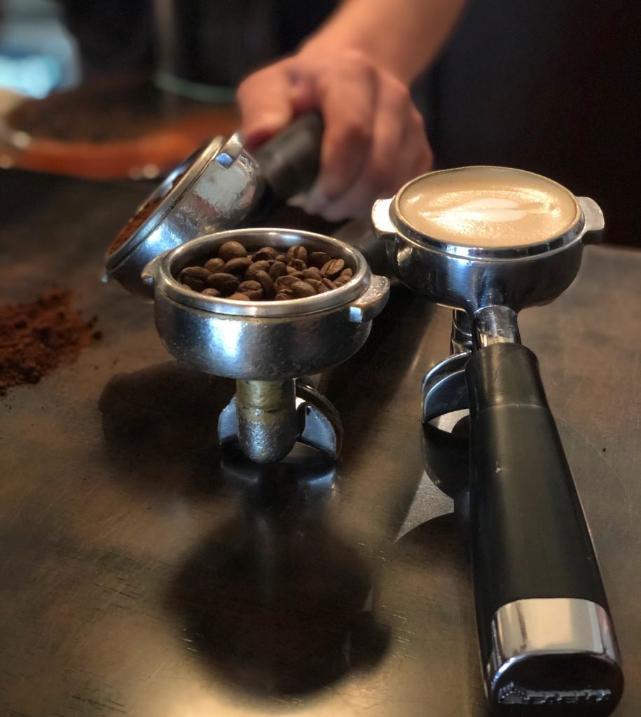 hand holding coffee cup