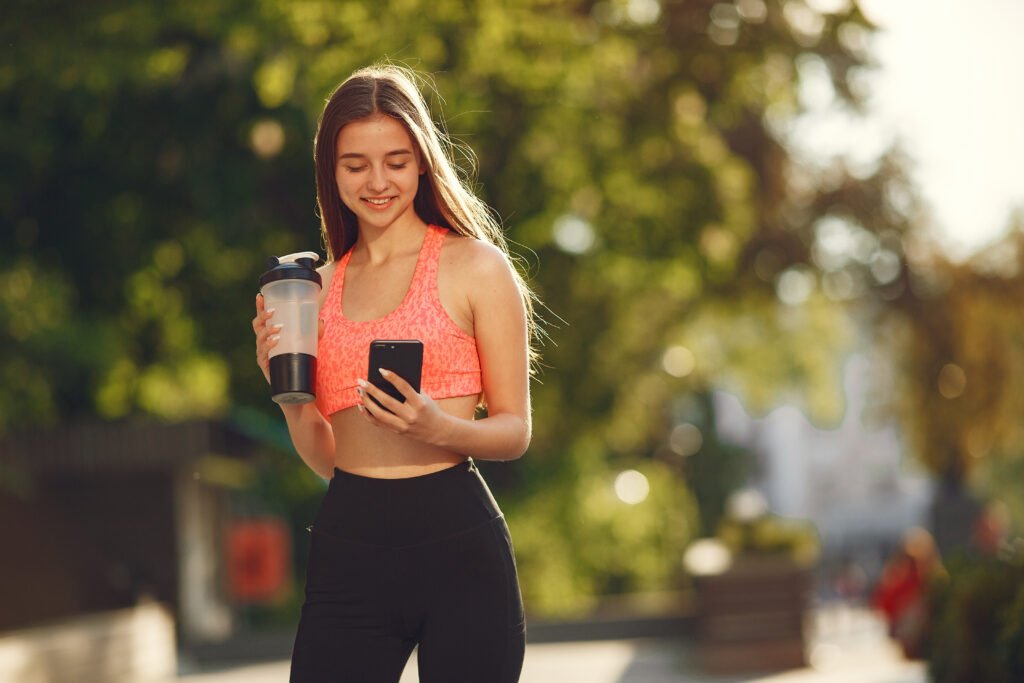 woman practicing advanced yoga summer city